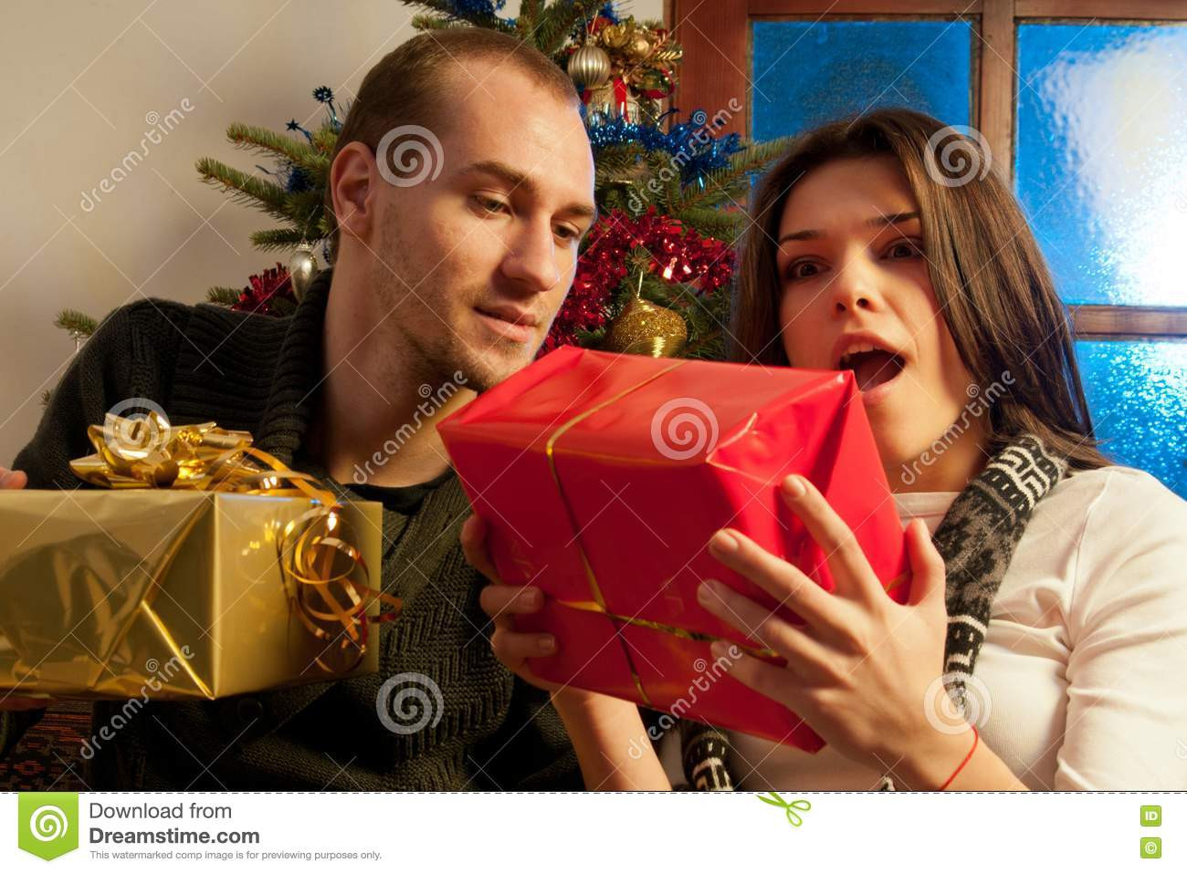 Christmas Gift Ideas Young Couple
 Young Couple Enjoying Gifts Stock Image Image