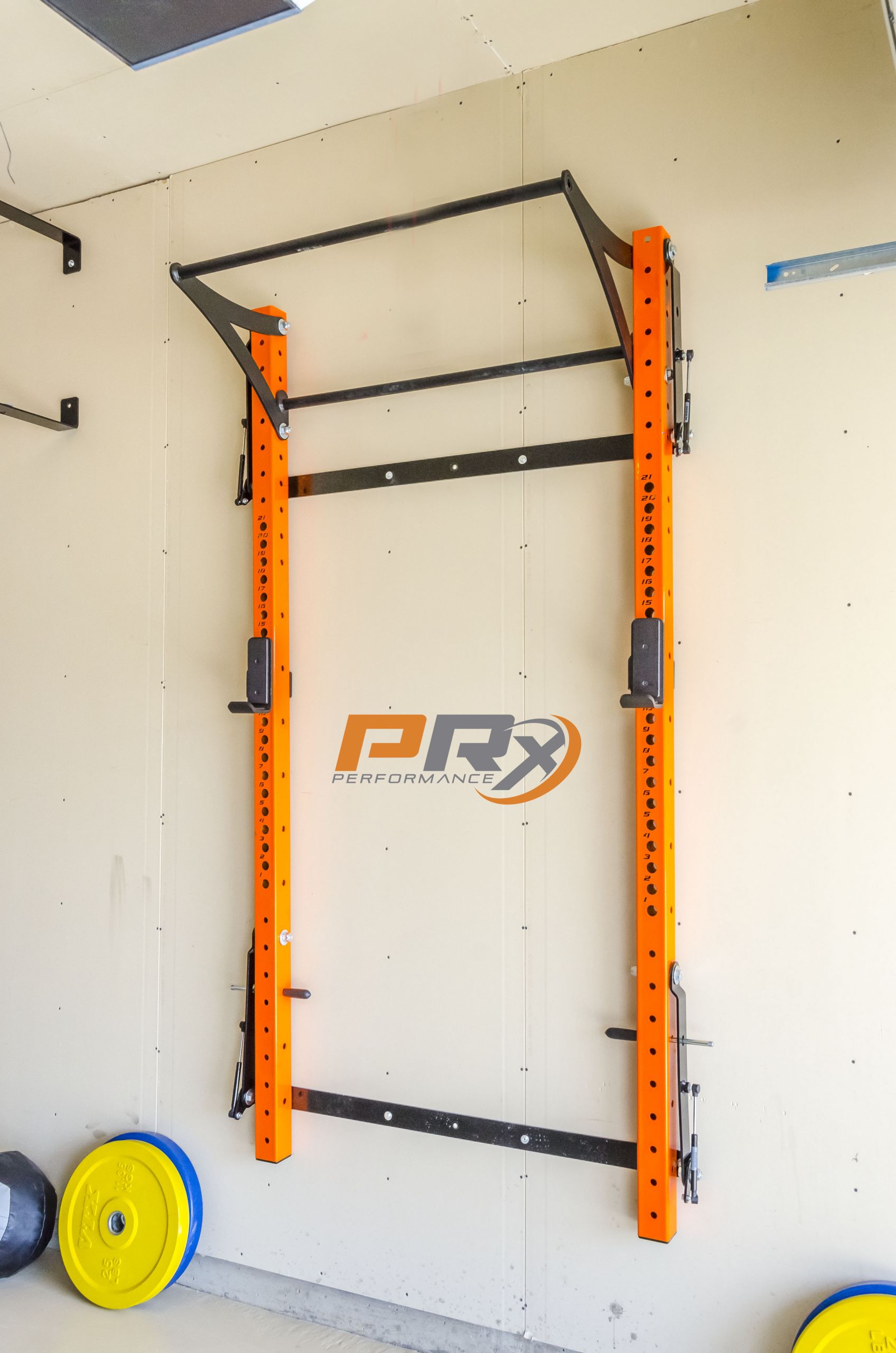 DIY Wall Mounted Squat Rack
 The Space Saving Squat Rack all folded up and out of the