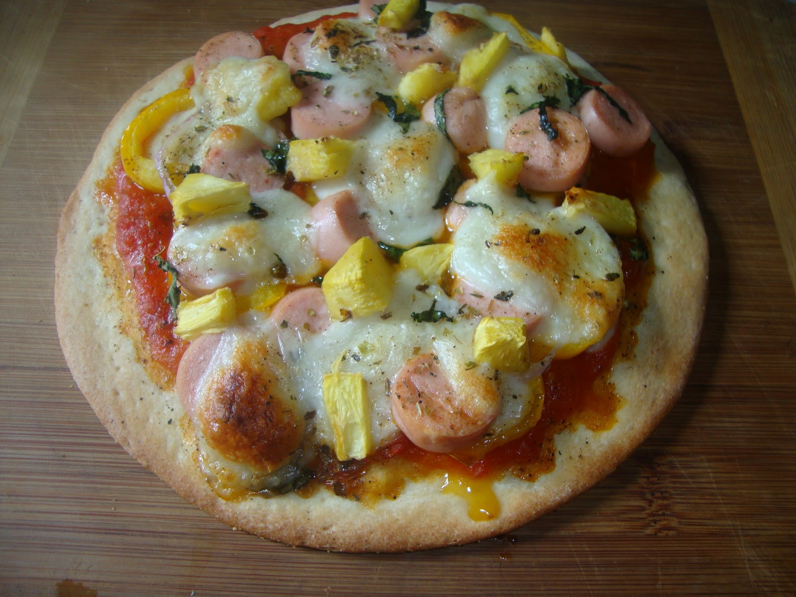 Franks Chicken And Pizza
 Cooking Delights Pizza with chicken franks and pineapple