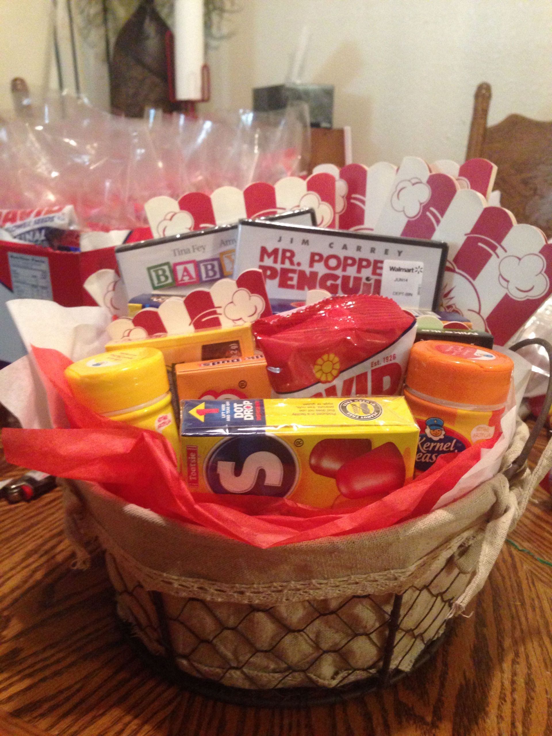 Gift Basket Ideas For Baby Shower Raffle
 Here is the diaper raffle prize for my baby shower A movie night in a basket plete with