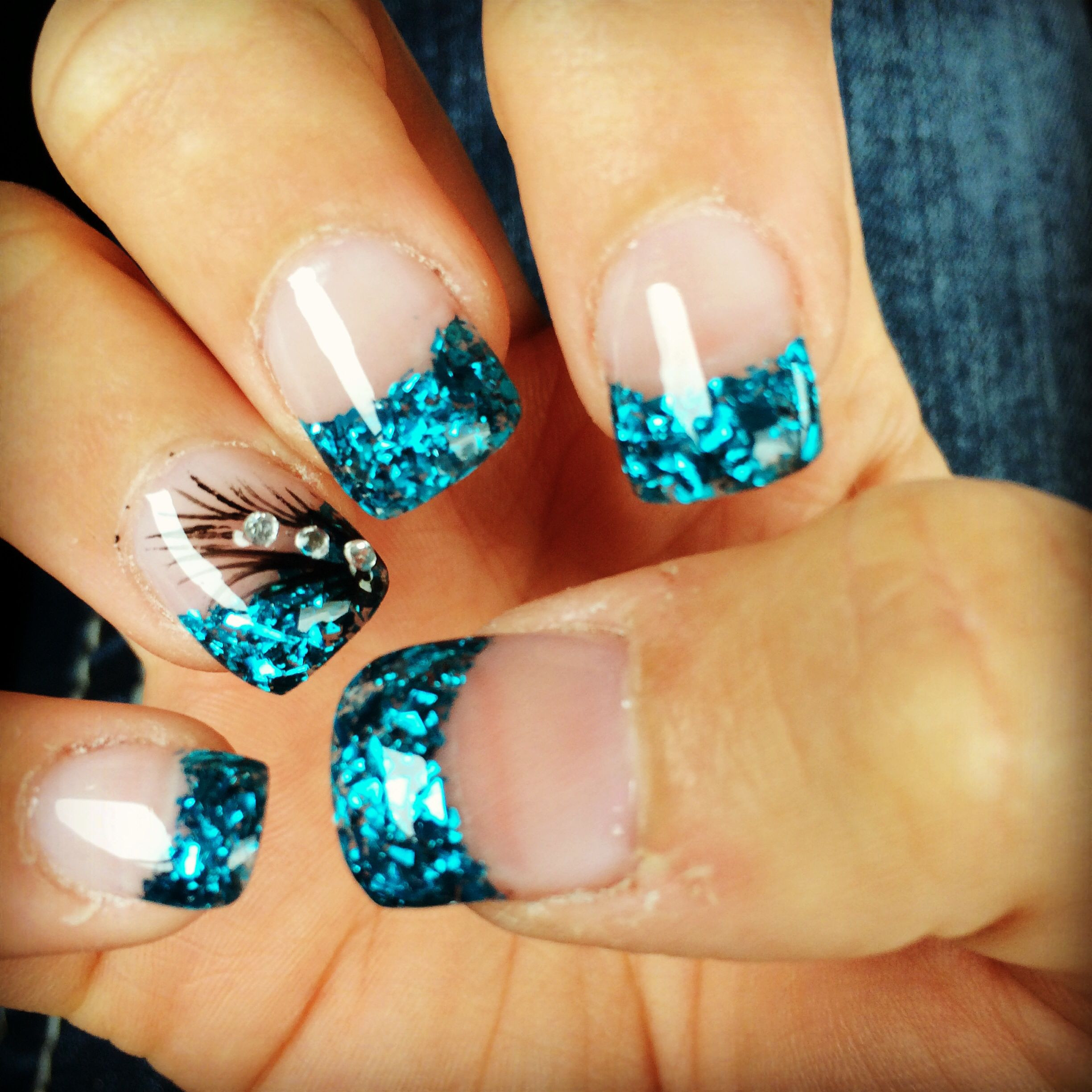 Acrylic Nail Colors And Designs
 Colored Acrylic tips with a feather design