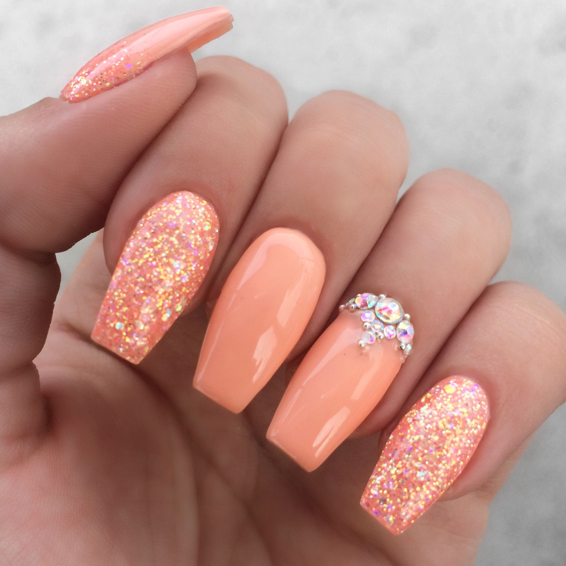 Acrylic Nails With Glitter
 Girly peach glitter rhinestone nails