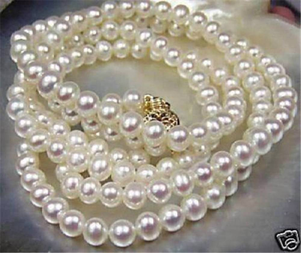 Akoya Pearl Necklace
 Beautiful 7 8mm White Akoya Cultured Pearl Necklace 25"
