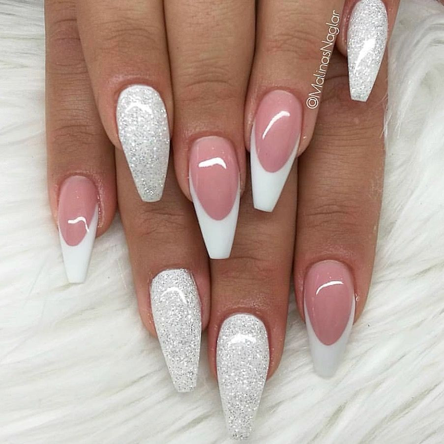 Beautiful Coffin Nails
 Beautiful white coffin nails with a mix of reverse french