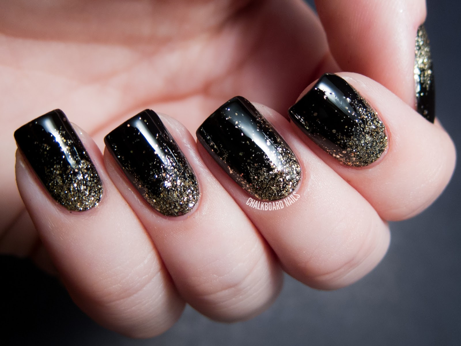 Black Nails With Glitter
 Party Perfect Black and Gold Nail Art Ideas