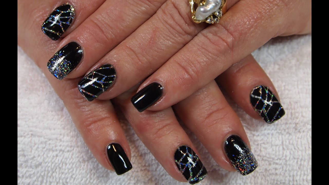Black Nails With Silver Glitter
 Stunning Black Gel Nails with Holo Silver Glitter