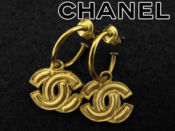 Chanel Cc Logo Earrings
 Authentic Chanel Gold Plated CC Logo Vintage Pierce Earring