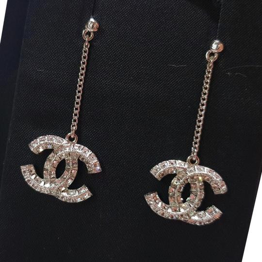 Chanel Cc Logo Earrings
 Chanel Silver Cc Logo Crystal Long Drop Earrings Tradesy
