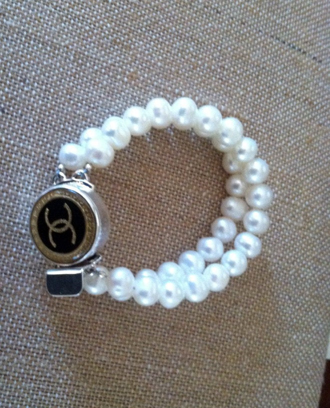 Chanel Pearl Bracelet
 Chanel Button Double Strand Pearl Bracelet