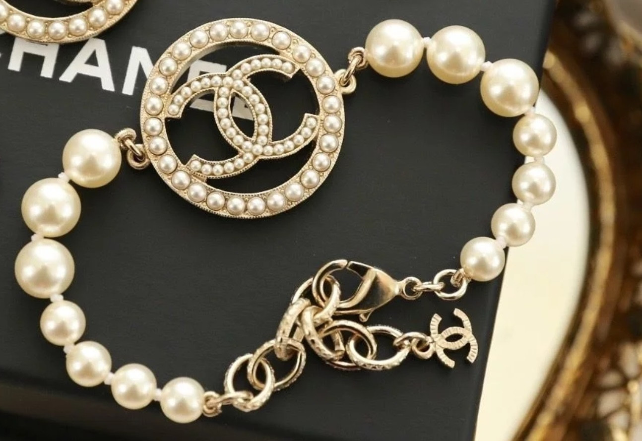 Chanel Pearl Bracelet
 Authentic CHANEL 2017 CC Charm Pearl Bracelet Gold NEW