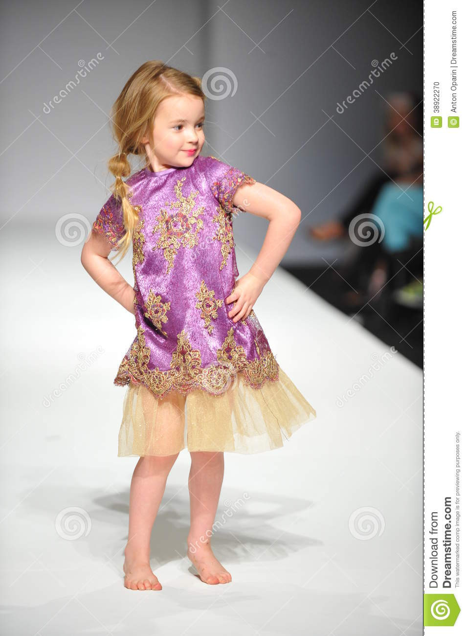 Children Fashion Model
 A Child Walks Runway At Nancy Vuu Children Show Editorial