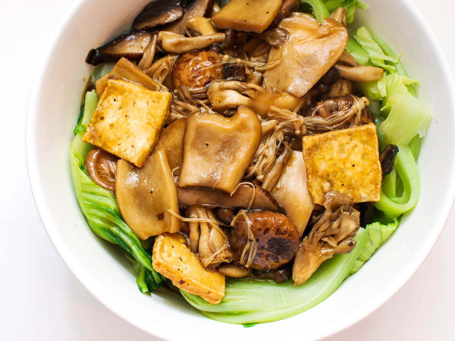 Chinese New Year Dishes Recipes
 Mushrooms and Tofu With Mustard Greens is a Ve arian