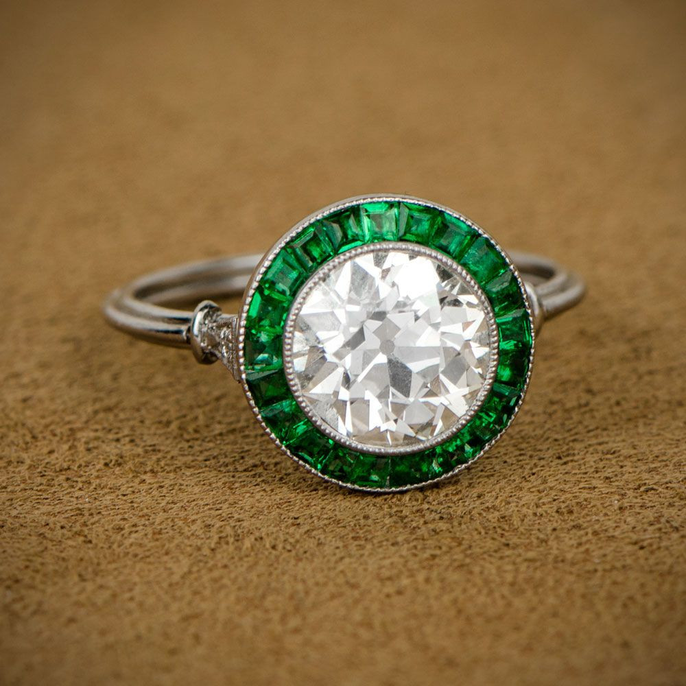 Diamond And Emerald Engagement Ring
 Diamond and Emerald Halo Engagement Ring