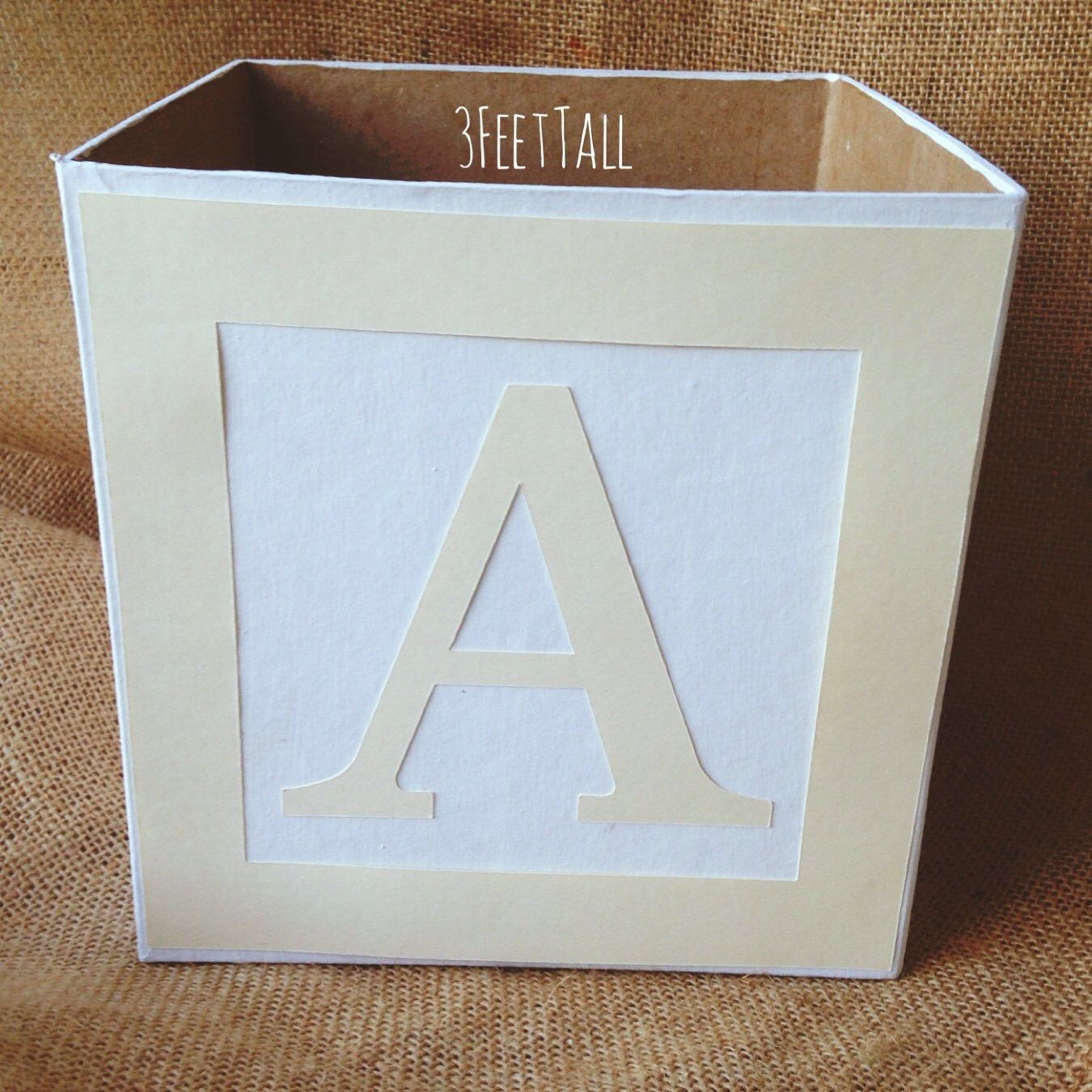 DIY Baby Blocks Centerpiece
 Finishing these pretty alphabet blocks for a baby shower