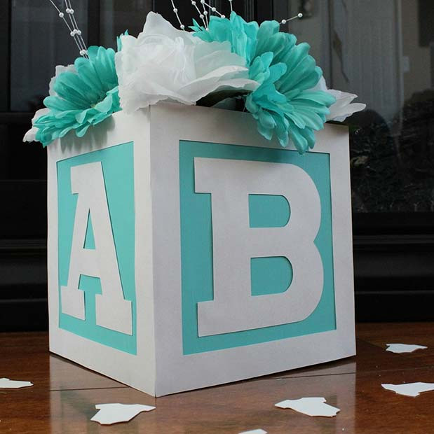 DIY Baby Blocks Centerpiece
 43 Cool and Creative Baby Shower Ideas for 2020