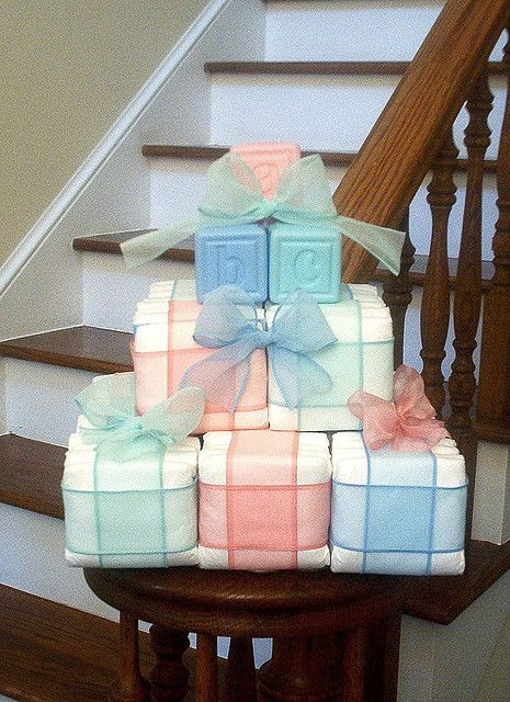 DIY Baby Blocks Centerpiece
 23 Easy To Make Baby Shower Centerpieces & Table