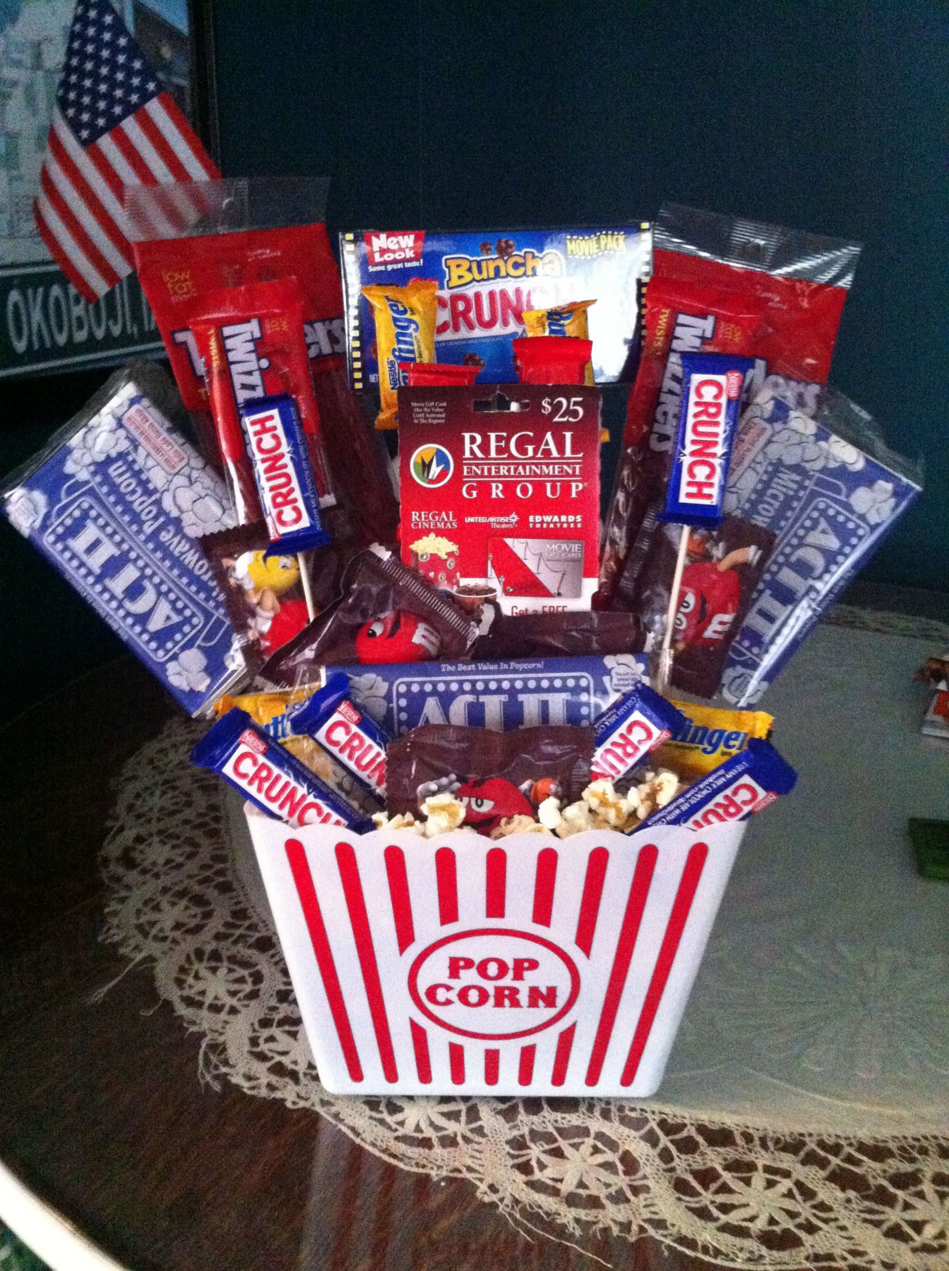Diy Gift Basket Theme Ideas
 Movie themed basket With a regal t card in middle