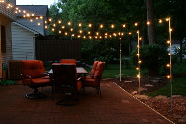 DIY Outdoor Lighting Without Electricity
 support poles for patio lights made from rebar and