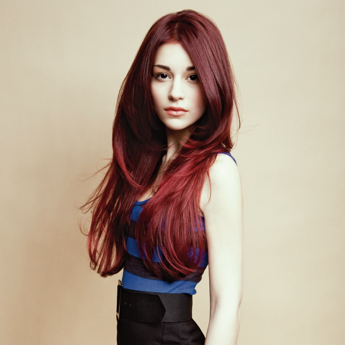 Extra Long Hairstyles
 Extra long and layered hairstyle with a dark red haircolor