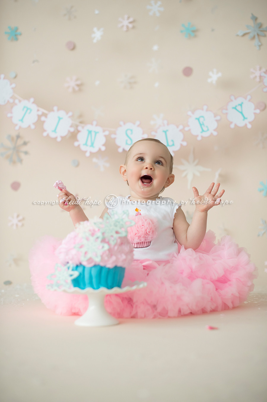 First Birthday Smash Cake
 A winter wonderland cake smash with first birthday girl T
