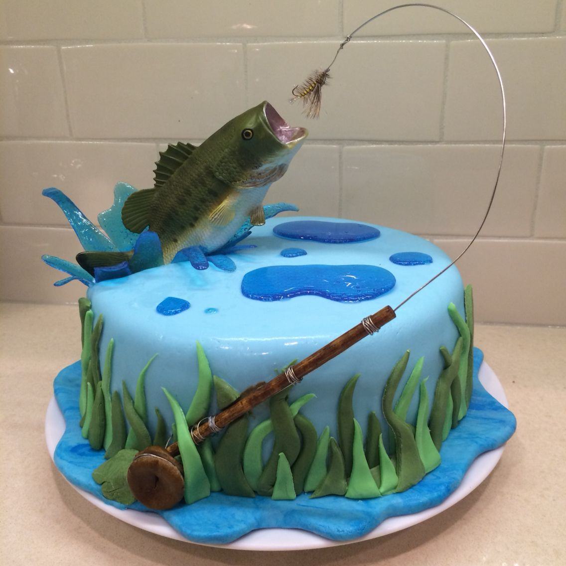 Fish Birthday Cakes
 Fly fishing cake for my hubby Bass jumping out of water