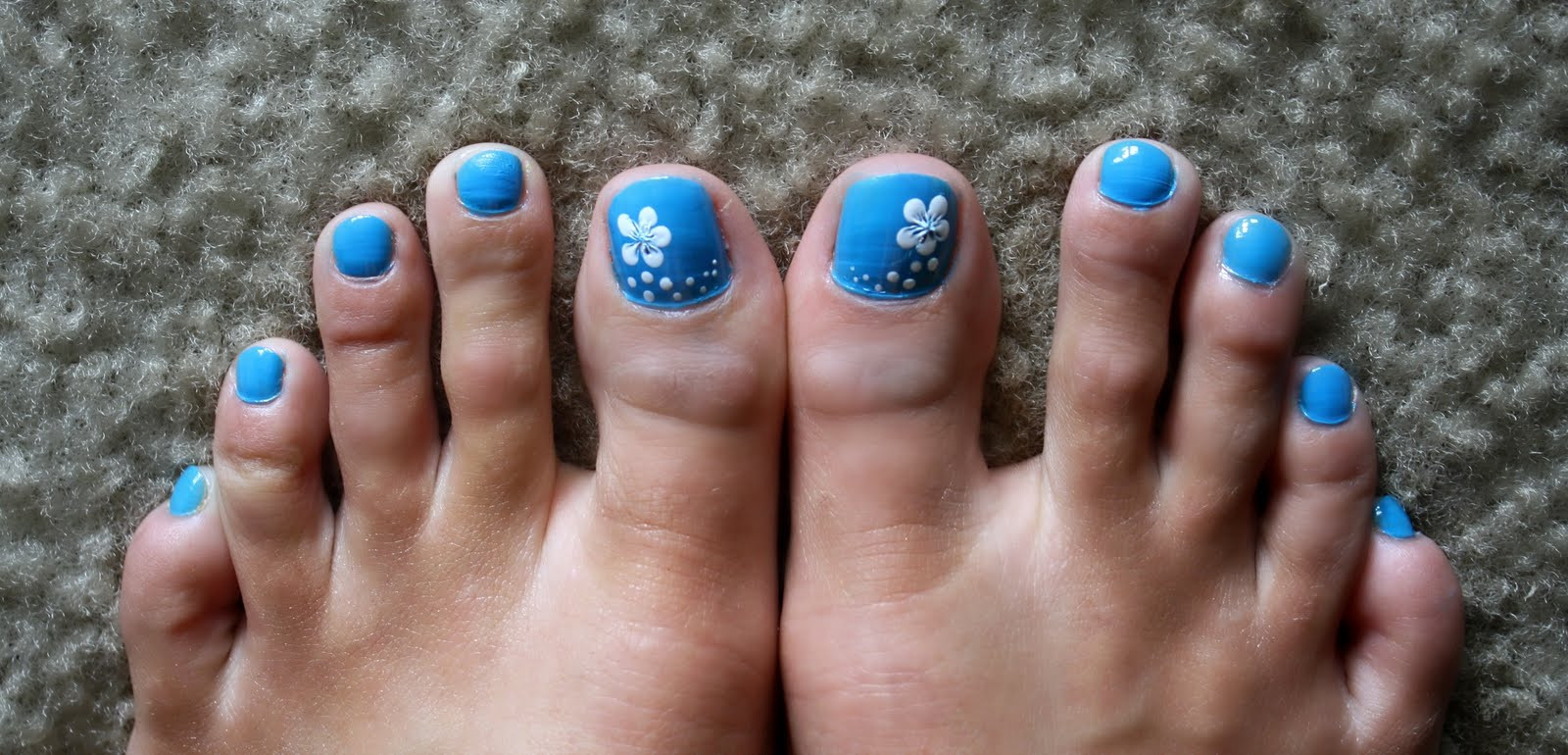 Flower Nail Art Designs For Toes
 Tails to Tell A Blue Background and a Little White Hibiscus