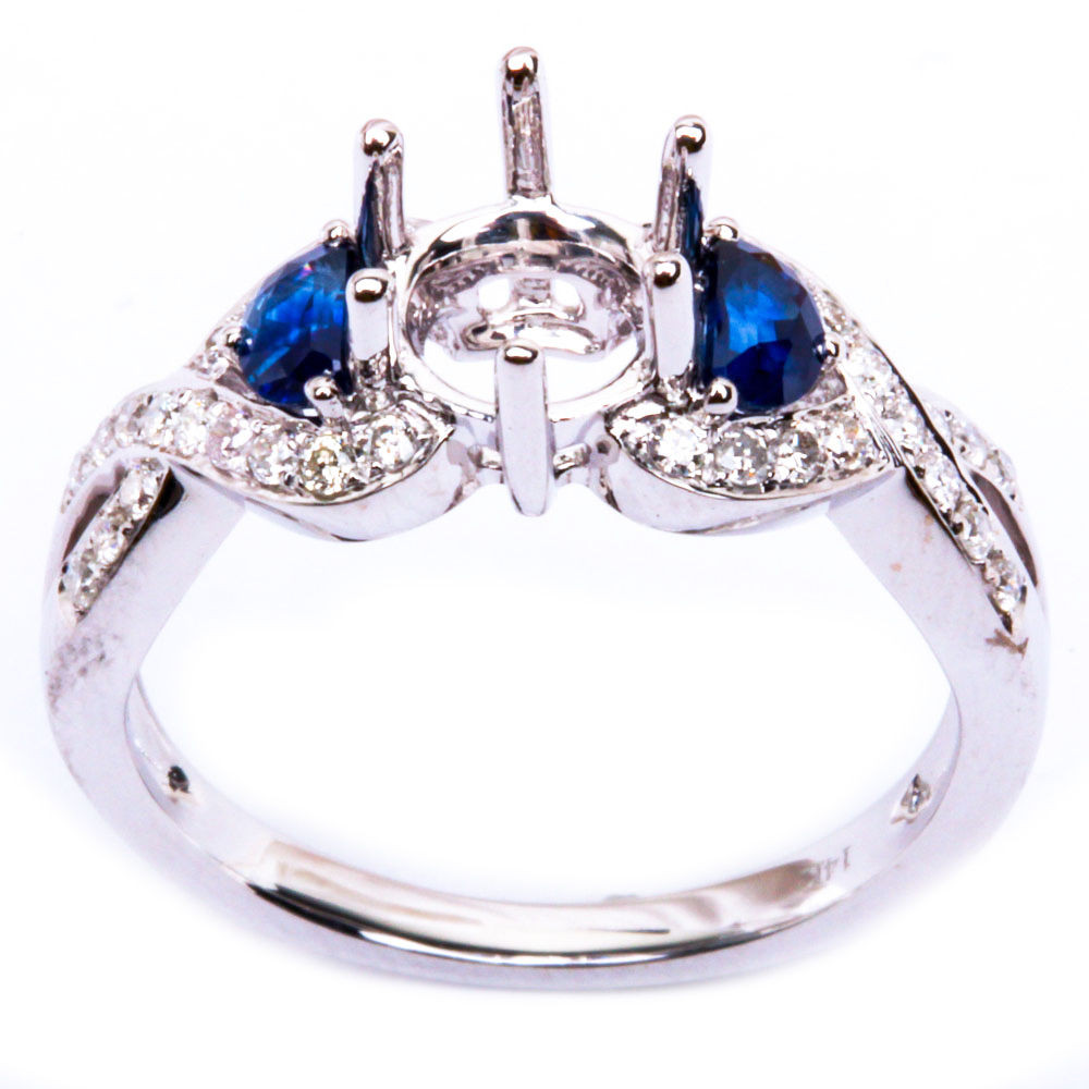 Gemstone Engagement Rings
 Twisted Prong 66ct Blue Sapphire Gemstone & Diamond Semi