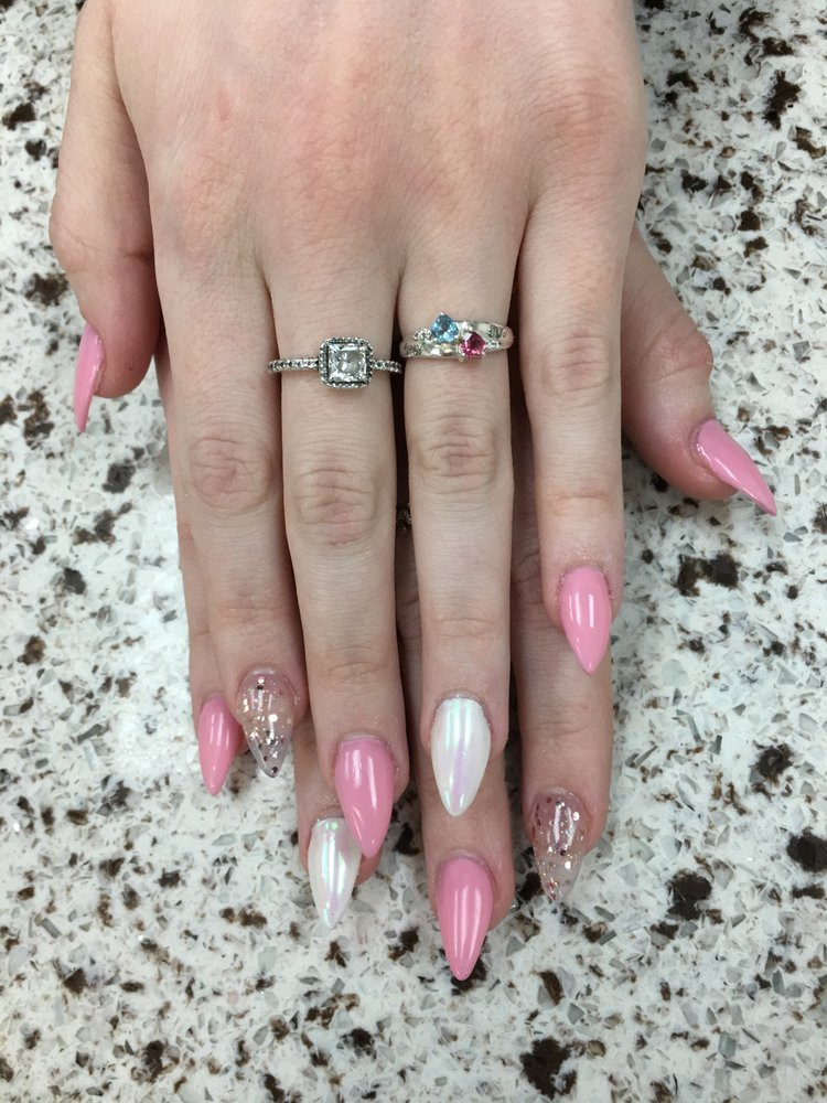 Glitter Nails Salon
 Almond shaped nails with a pink white chrome and glitter