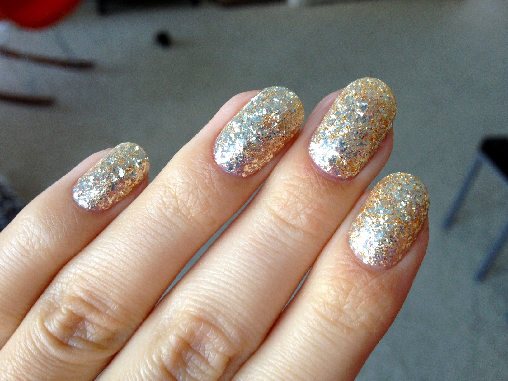 Gold Glitter Gel Nails
 January 2013