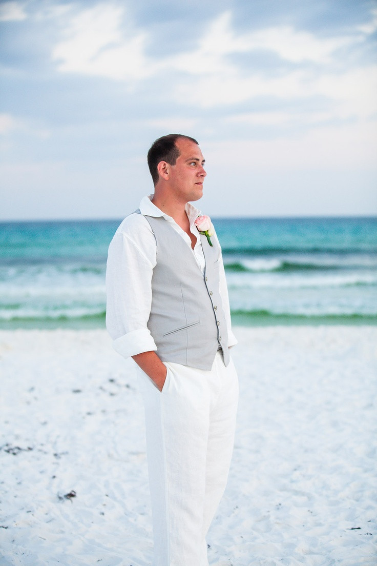Groom Beach Wedding Attire
 Picture white pants a white shirt a light grey vest