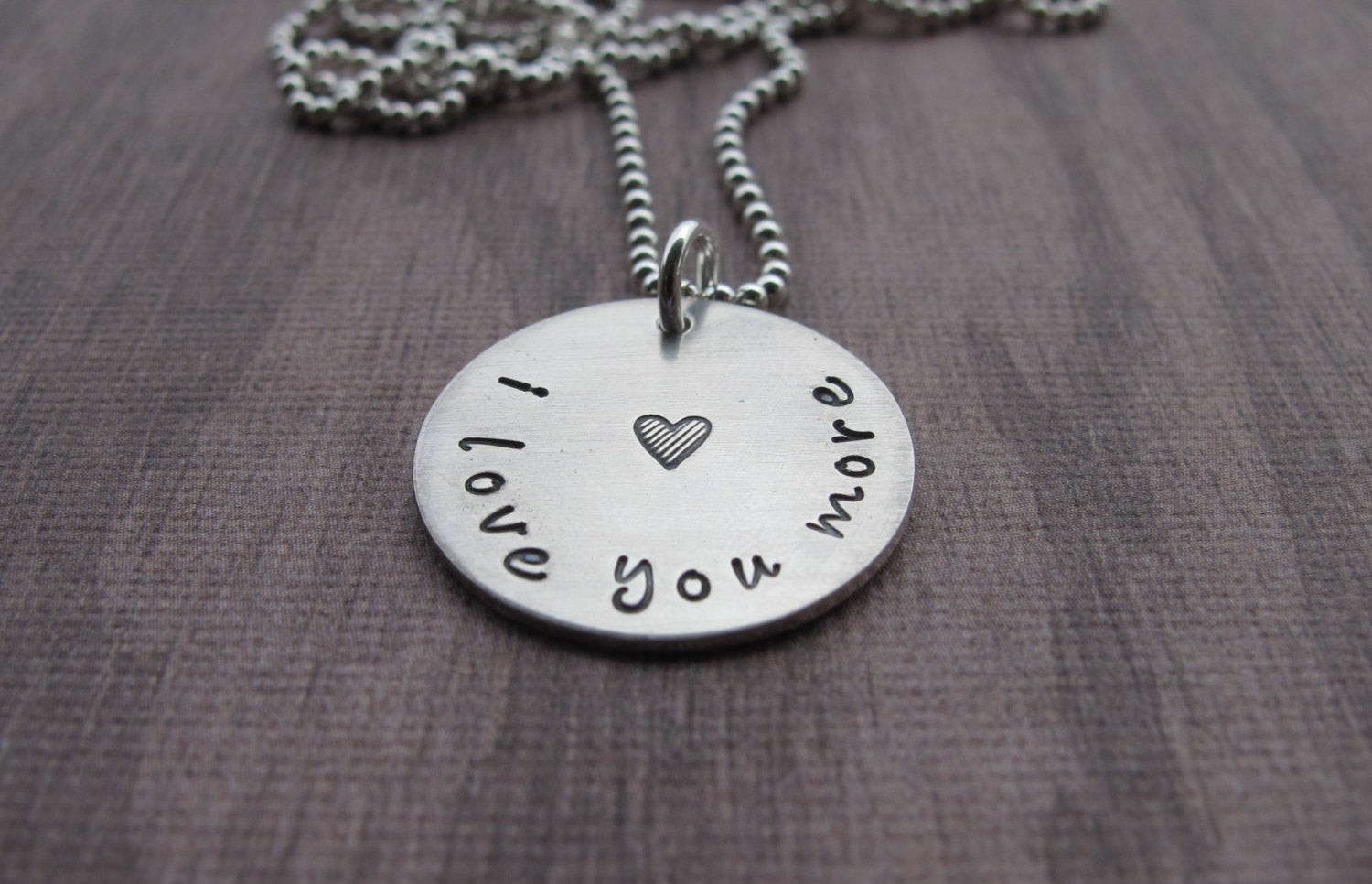 I Love You More Necklace
 I love you more Necklace Love you More Stamped Heart Hand