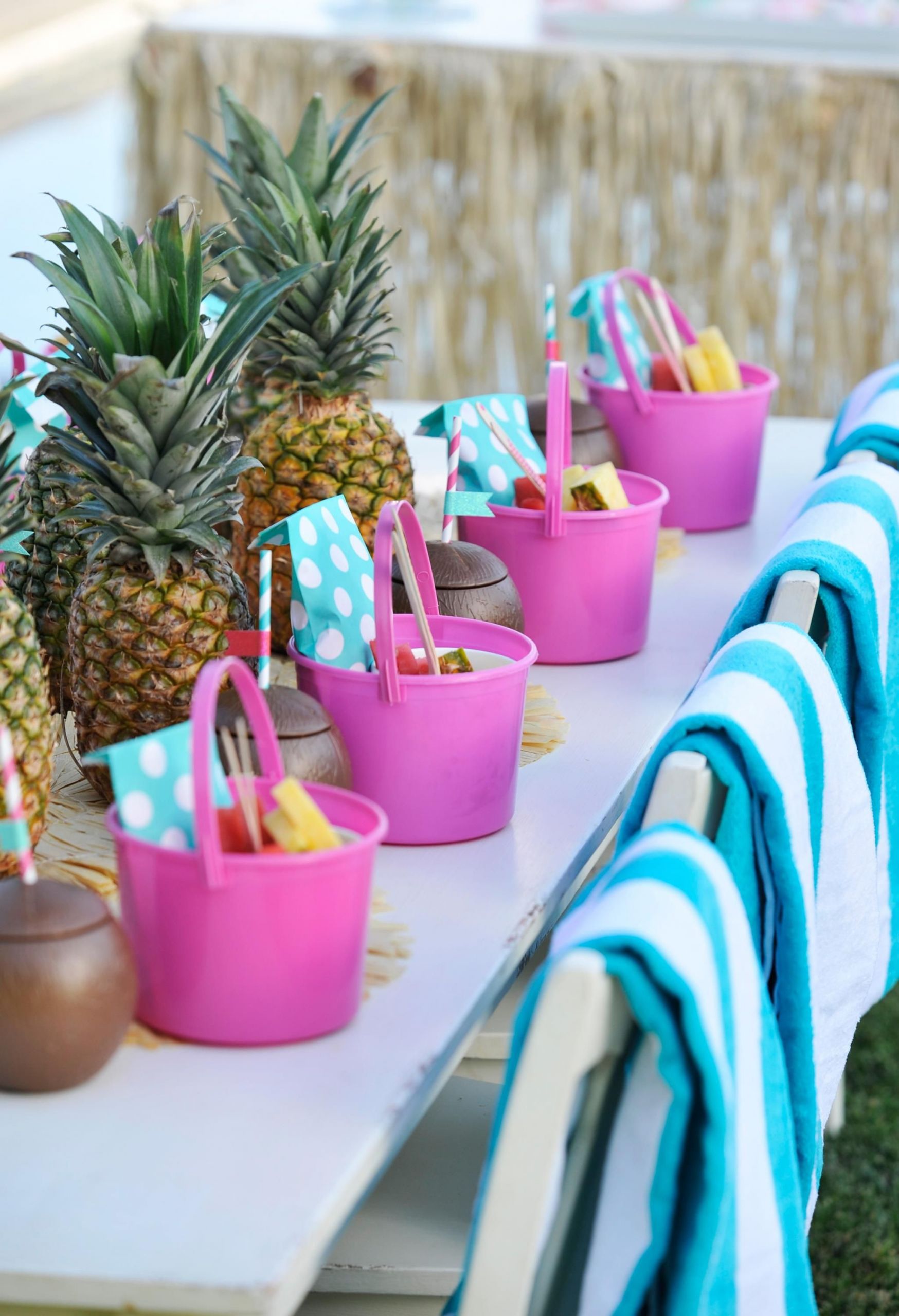 Kids Pool Party Decoration Ideas
 Kids Pool Party Table with Pineapple Centerpieces