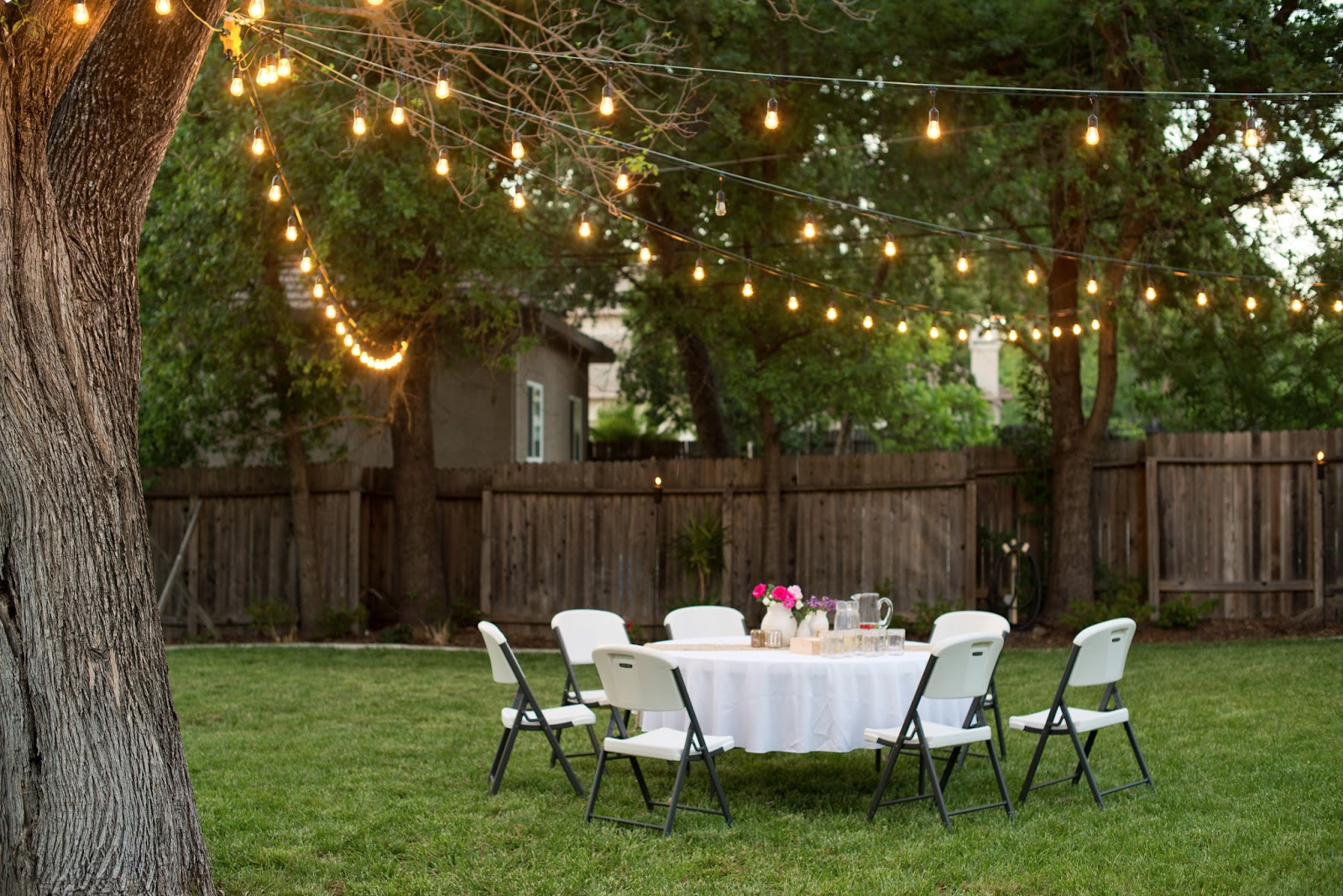 Lighting Ideas For Backyard Party
 Domestic Fashionista Backyard Anniversary Dinner Party