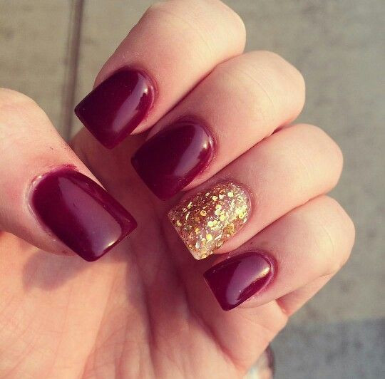 Maroon Nails With Glitter
 Red maroon and gold glitter nails