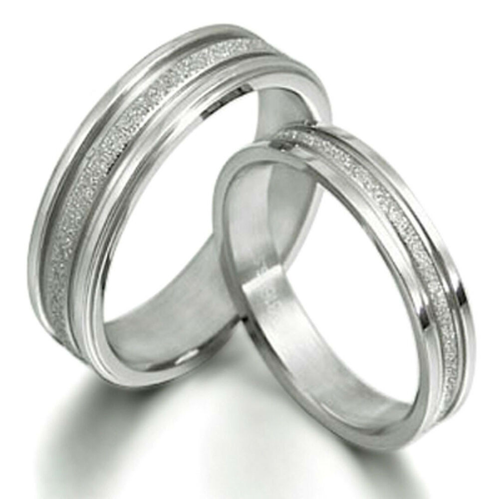 Matching Wedding Band Sets
 His and Her Matching Wedding Bands Titanium Ring Set 016A3