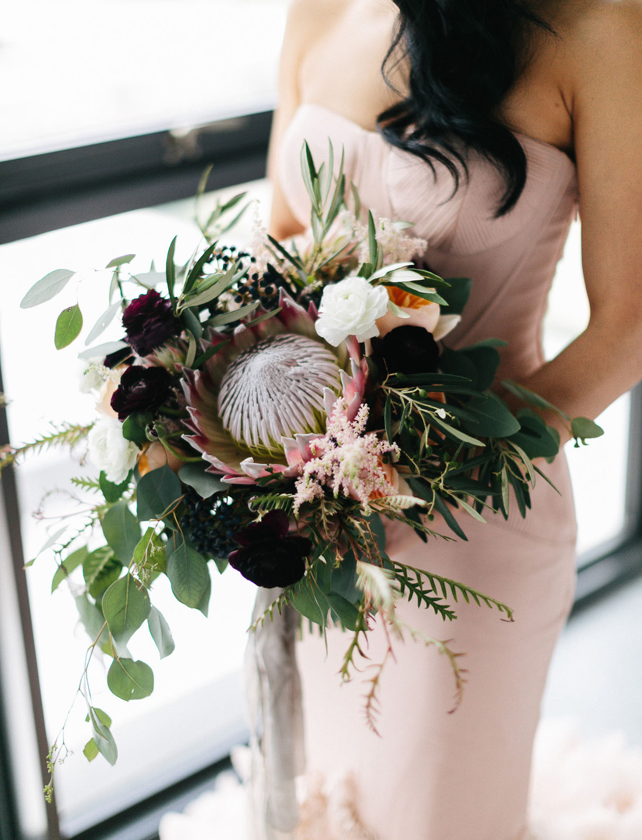 Modern Wedding Flowers
 The Bride Wore a Stunning Blush Dress at this Industrial