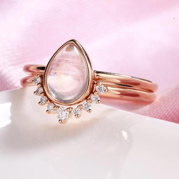 Moonstone Wedding Ring Sets
 14K rose gold moonstone engagement ring set vintage pear