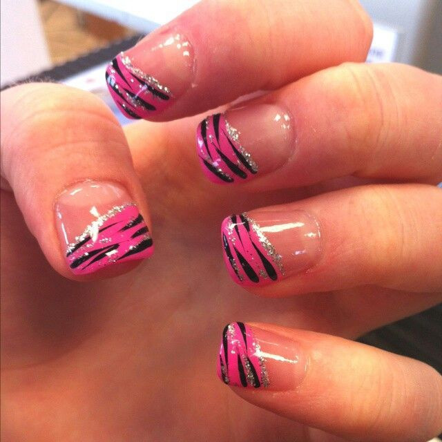 Nail Designs Zebra
 Hot pink zebra nails with a strip of glittery silver