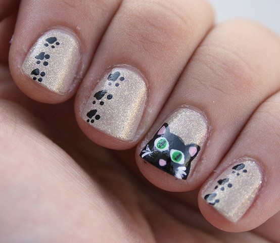 Paw Print Nail Designs
 Kitty and paw print nails