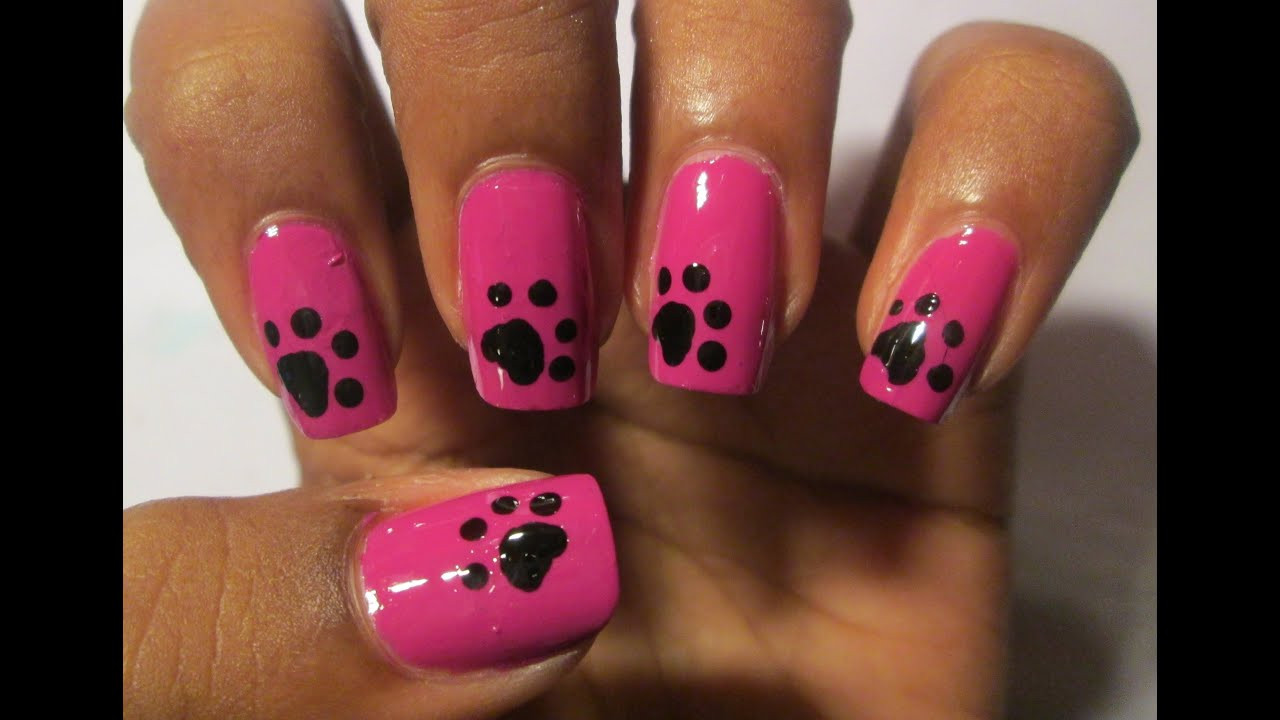 7. Minimalist Paw Print Nail Art for a Subtle Look - wide 2