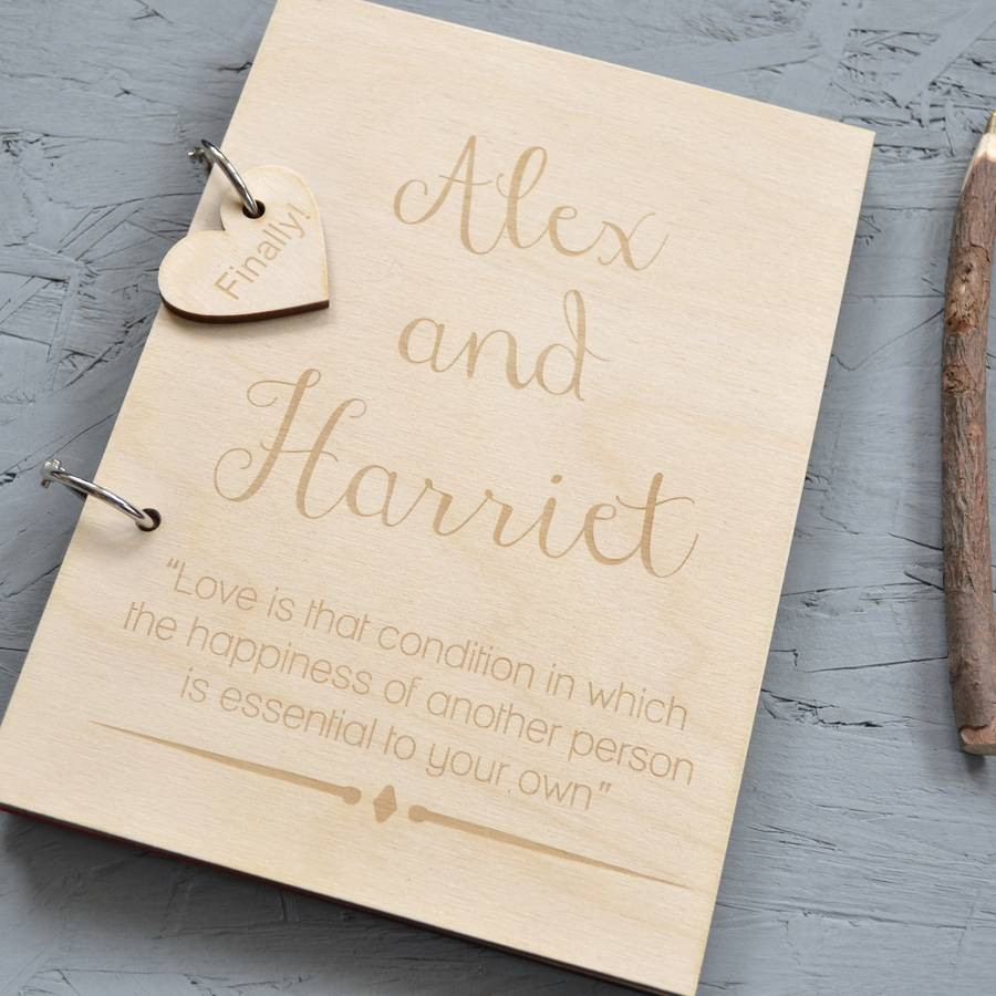 Photo Wedding Guest Books
 personalised wooden guest book by clouds and currents