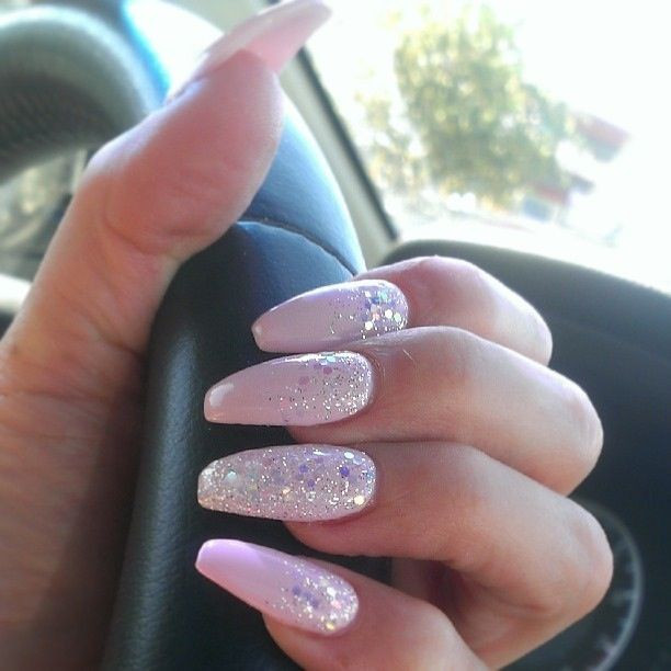 Pink Coffin Nails With Glitter
 Coffin shape Pink nails with glitter cascade and glitter