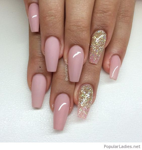 Pink Nails With Gold Glitter
 Long pink nails with gold glitter