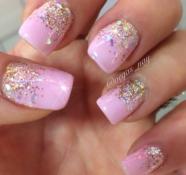 Pink Nails With Gold Glitter
 Light pink gel with an ombré sparkle nail design