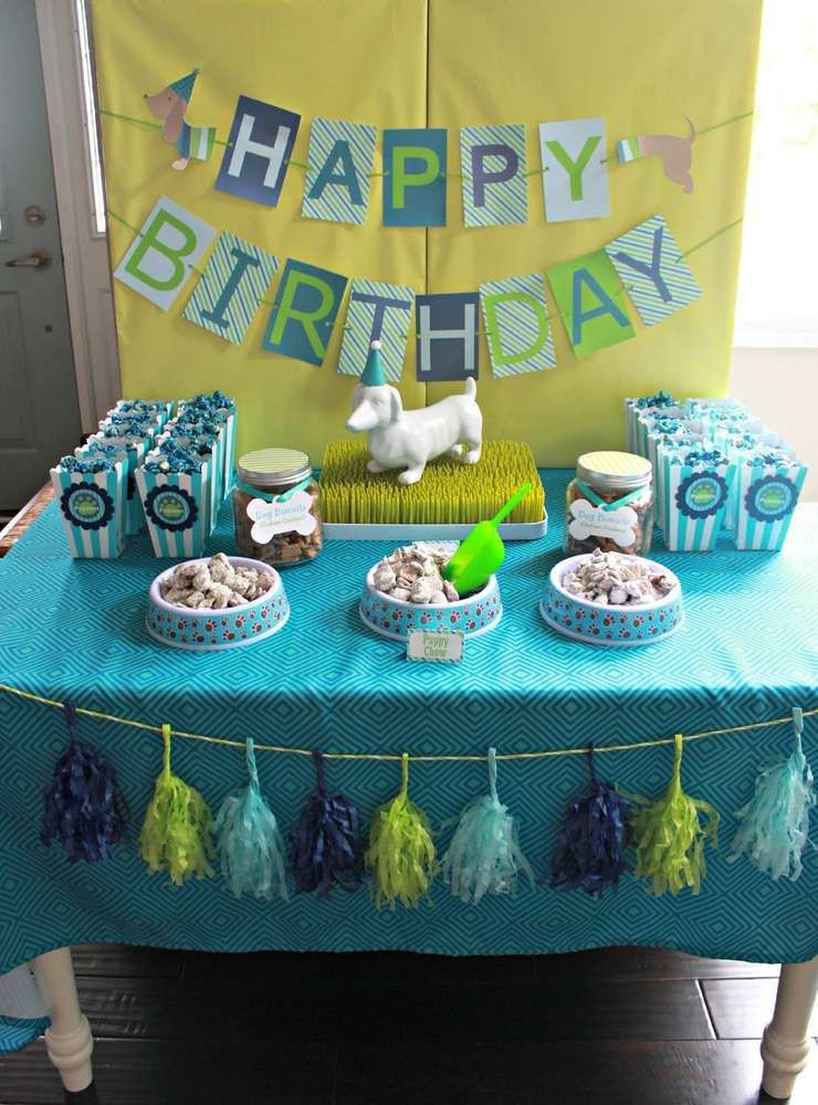 Puppy Party For Kids
 Blue and green backdrop dessert table and banner at a