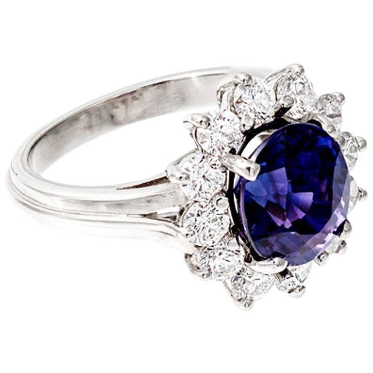 Purple Diamond Engagement Rings
 Oval Blue Purple Sapphire Diamond Halo Engagement Ring For