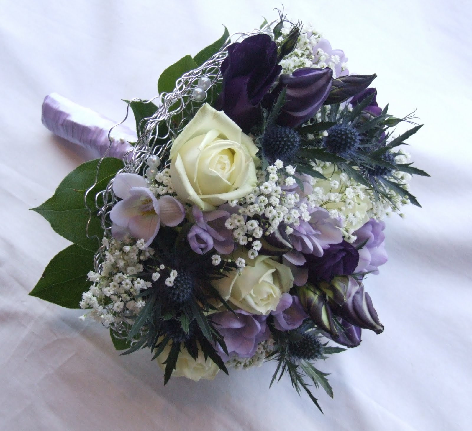 Purple Flowers For Wedding
 RJ s Florist Purple lilac and ivory wedding flowers