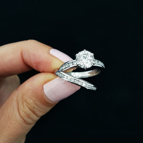 Round Wedding Rings
 Round Engagement Ring with matching Diamond Wedding Band