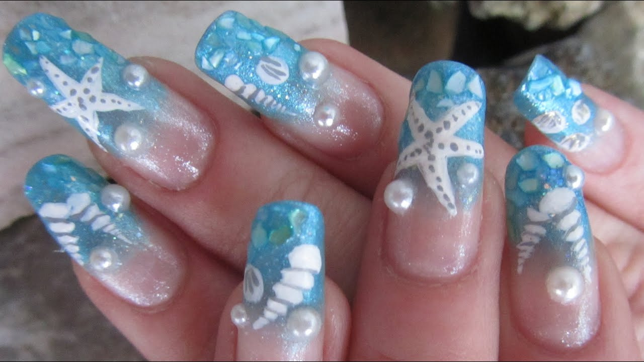 Sea Shell Nail Designs
 Ocean Sea Shell Design in Light Blue with Glitter and Half