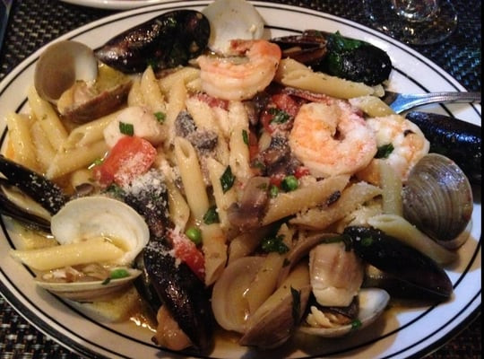 Shrimp And Scallop Pasta With White Wine Sauce
 Pasta with mussels clams scallops and shrimp in a white
